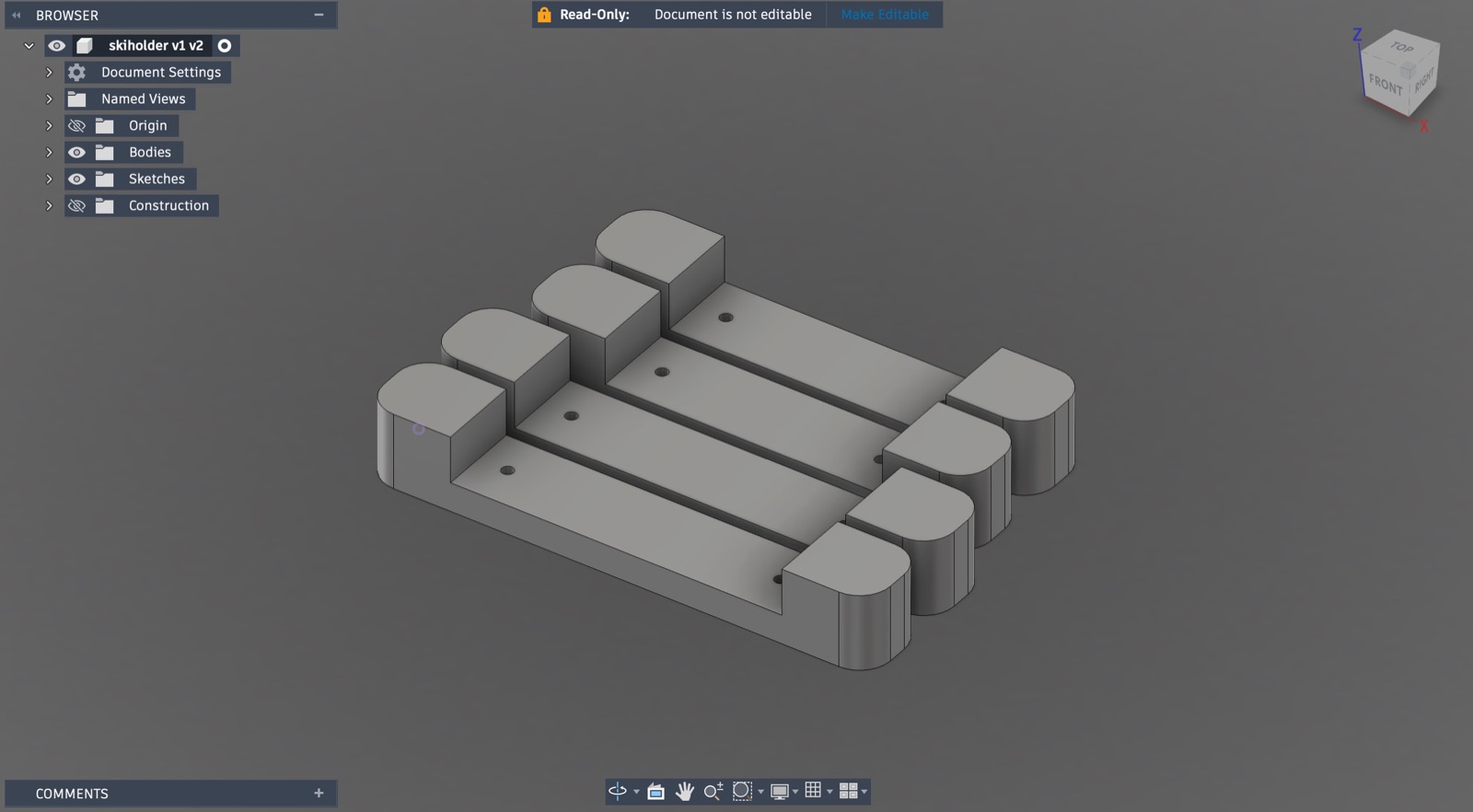 The parametric model in Fusion 360 — four brackets, one per ski, two pairs' worth, laid out to be machined together from one piece of stock.