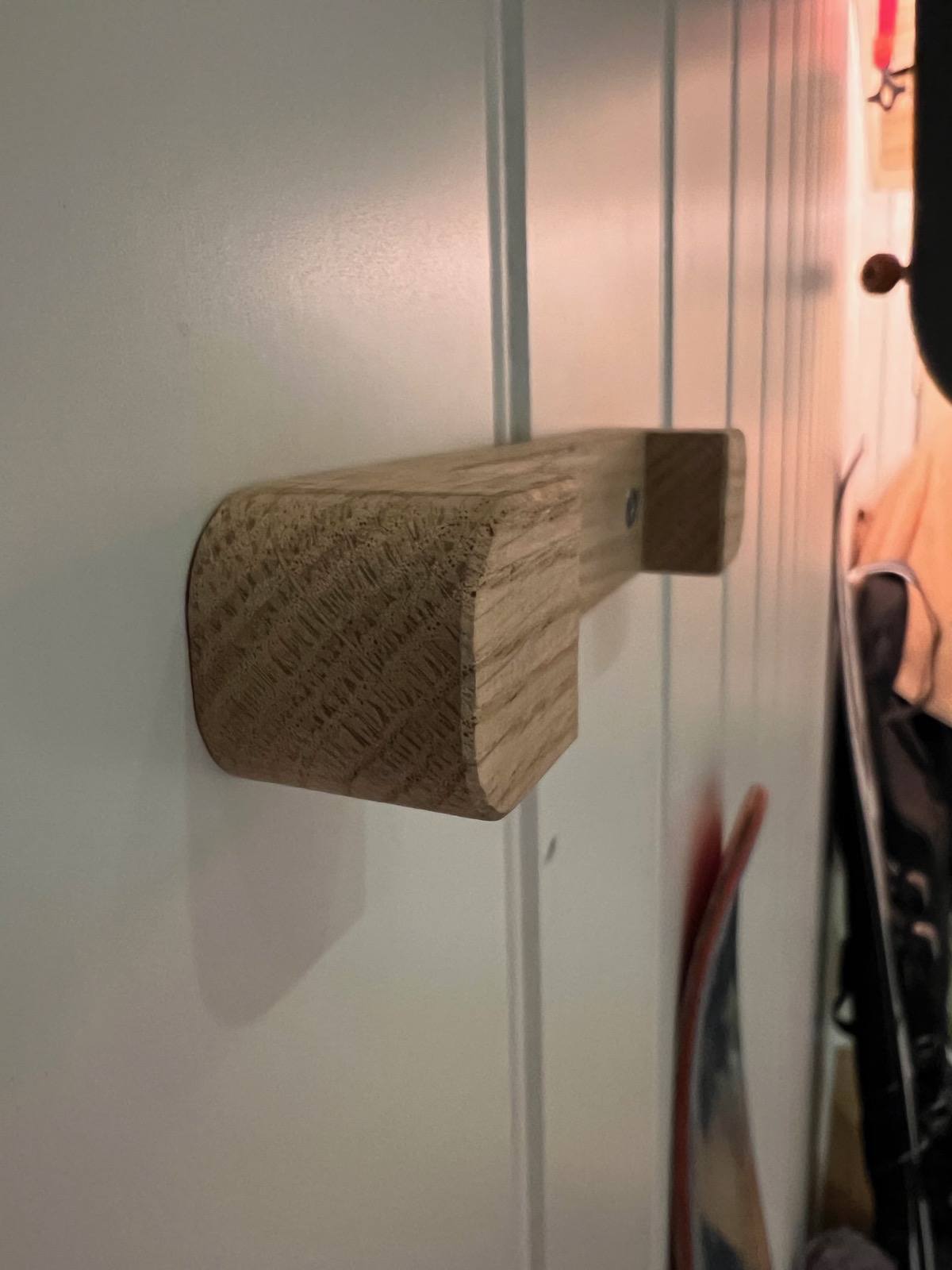 From the side, the chamfer that wraps every edge — cosmetic, but mostly there so a ski slides into the pocket instead of catching on it. The crosshatch is the surfacing pass.